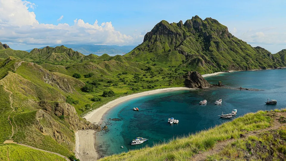 Green hills and sheltered bays on Padar Island